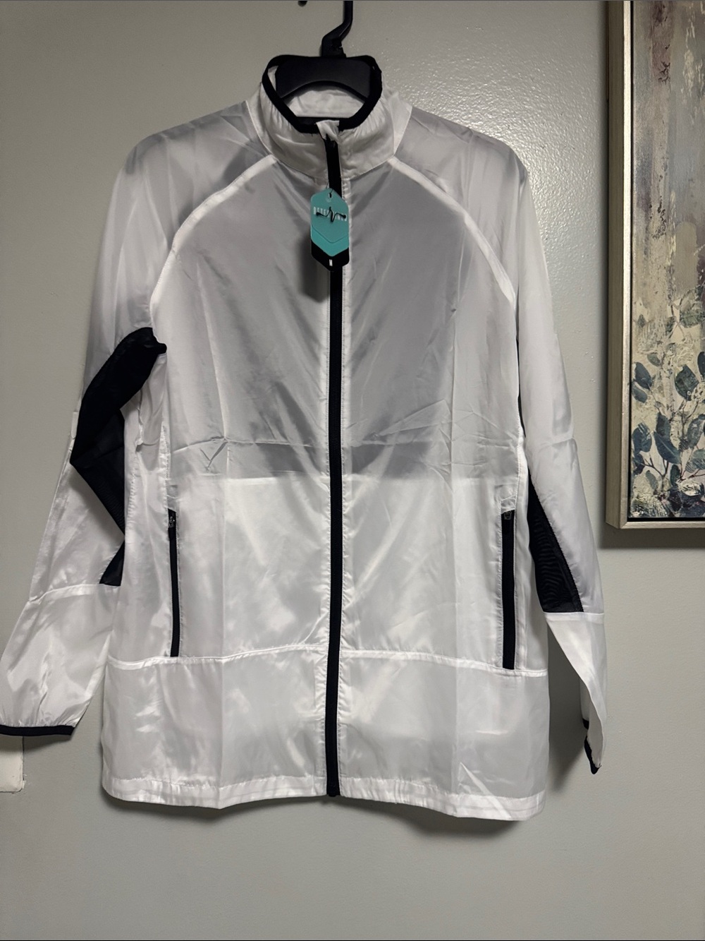 Lightweight White Packable Windbreaker Jacket with Black Trim